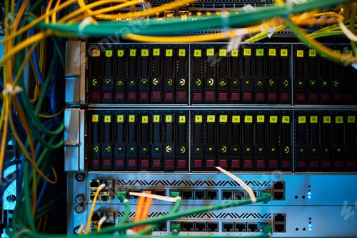 Preview: Multicolored Network Cables Connected to Server Rack