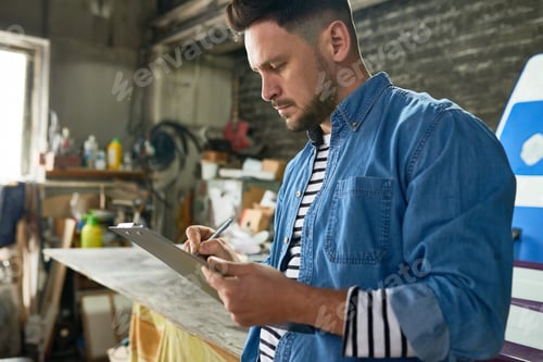 Preview: Man Planning Project in Workshop