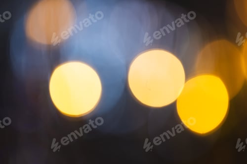 Preview: Multiple yellow bokeh lights with copy space on dark background
