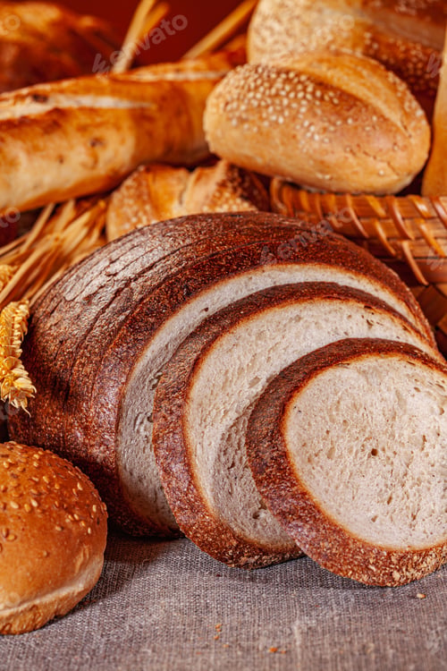 Preview: Fresh baked bread. Assorted bakery products loafs of bread and rolls...