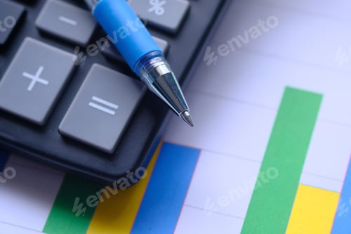 Preview: Calculator and a Pen placed carefully on Financial Growth Charts for analysis and evaluation
