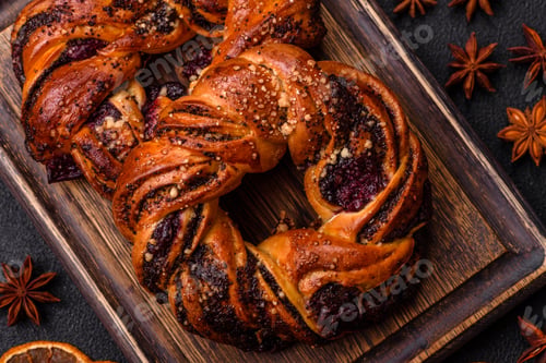 Preview: Delicious fresh baked bun with poppy seeds and berries