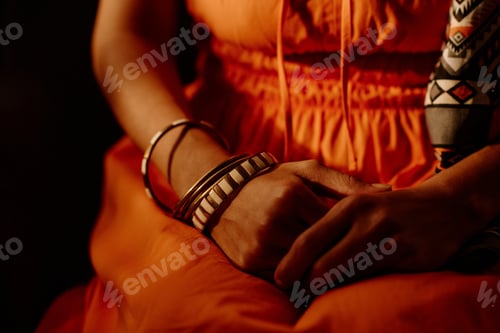 Preview: Stylish woman with bracelets on wrists