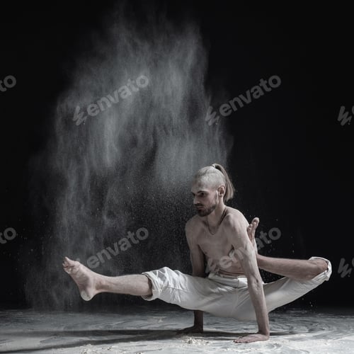 Preview: Flexible yoga man doing hand balance asana brahmachariasana.