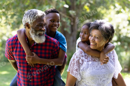 Preview: Senior mixed race couple enjoying their time at the garden