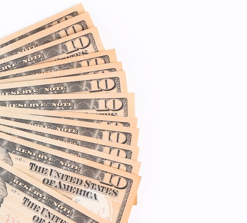 Preview: Stack of Ten Dollar Bills on White Background