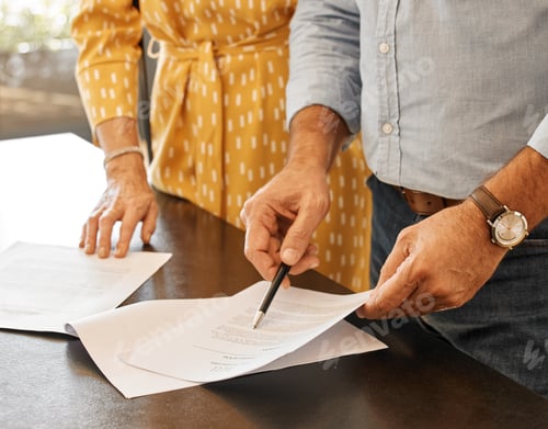 Preview: Theres a lot of paperwork. Shot of two unrecognizable people going through paperwork.