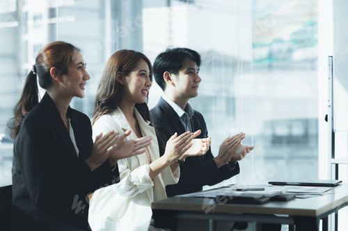 Preview: Business men and women clapping in the conference room, marketing department meeting staff presentin