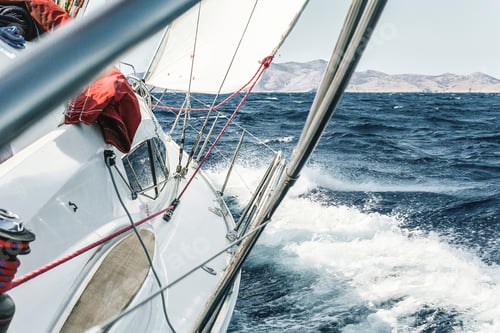 Preview: Aboard view of yacht sailing through ocean waves near coast, Croatia
