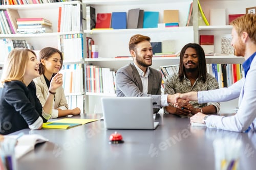 Preview: Businesspeople shaking hands in office