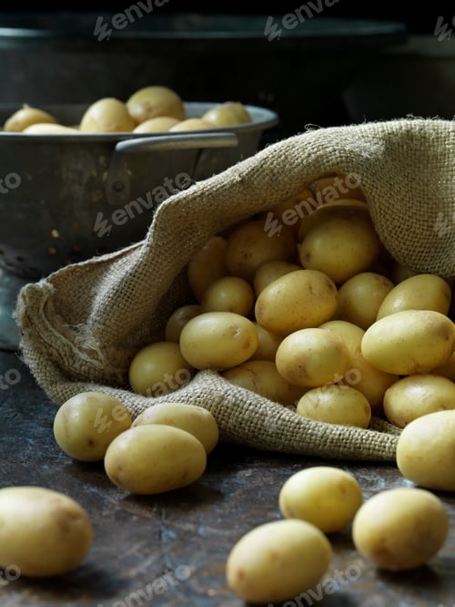 Burlap Bag Full of Yellow Potatoes