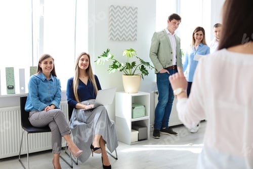 Preview: Young people having business training in office