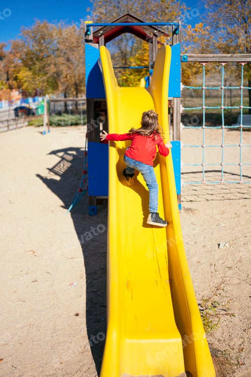 Preview: Little boy jumping on the slide ramp