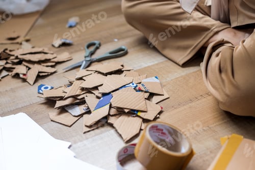 Preview: Close Up Of Crafting Materials With Pile Pf Cardboard Pieces For Creative Reuse