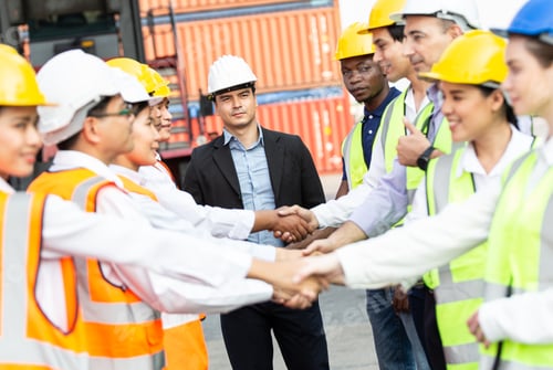 Preview: Group of successful logistic engineer worker hand shaking for business agreement