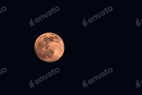 Preview: Close up of full moon on dark sky