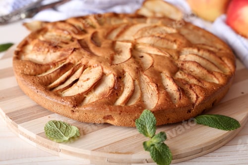 Preview: Appetizing pie close-up on a wooden background