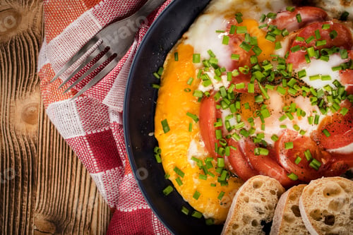 Preview: Homemade breakfast fried egg with tomato.