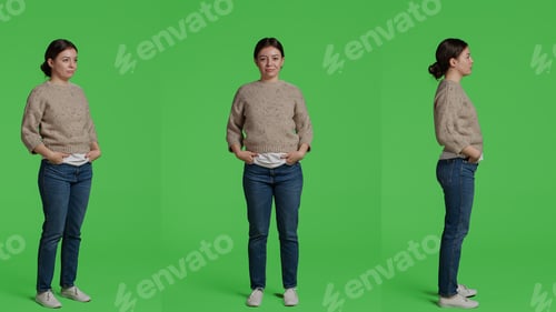 Preview: Female model posing on full body greenscreen backdrop