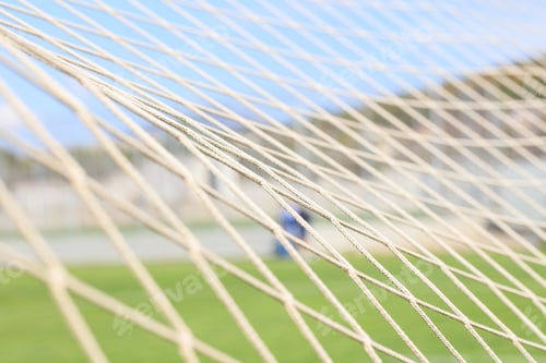 Preview: Soccer or football net background, view from behind the goal.