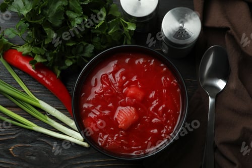 Preview: Concept of tasty food with borscht and ingredients on wooden background