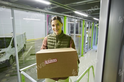 Preview: Woman getting parcel