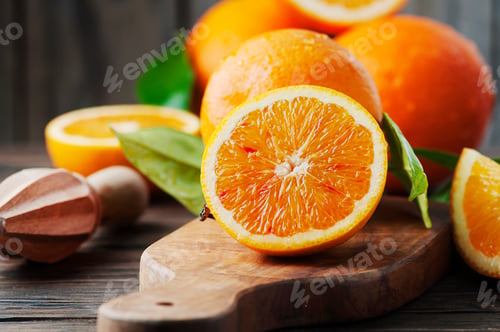 Preview: Fresh sweet oranges on the wooden table