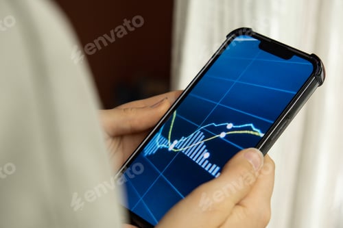 Preview: Female hands holding phone, checking Stock market graph for tranding and investment in security