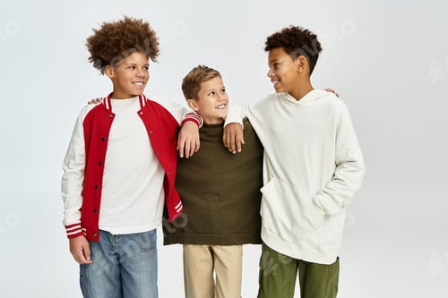 Preview: Celebrating friendship among three stylish little boys in vibrant outfits