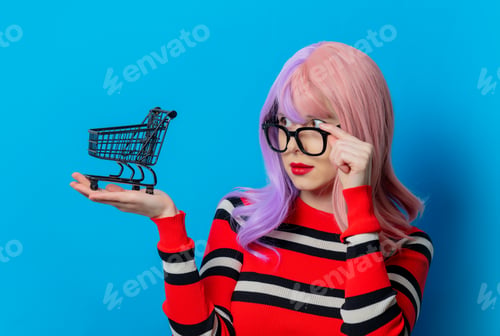 Preview: Girl with purple hair and red sweater hold black shopping cart