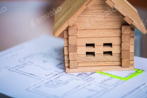 Preview: Building house on blueprints with worker - construction project