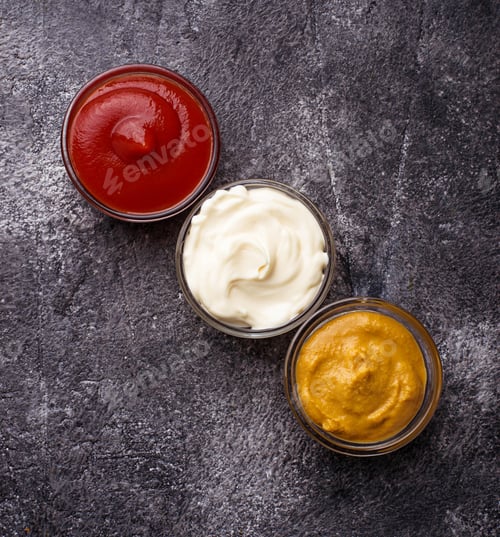 Preview: Set of different sauces: mustard, ketchup, mayonnaise.