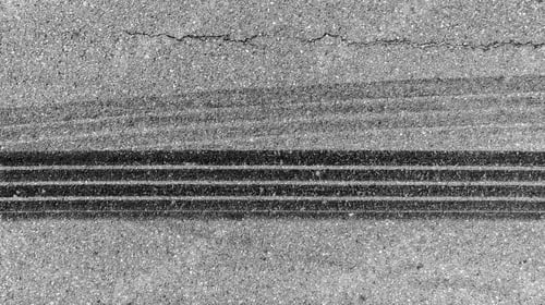 Preview: Aerial top view car tire marks burnout, Tire marks on the asphalt road, Tire mark on race track.