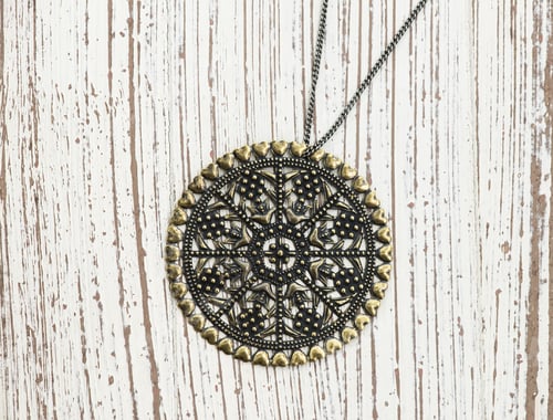 Preview: Vintage Pendant On White Wooden Background