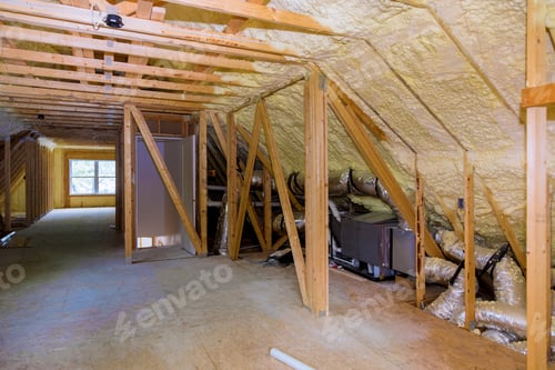 Preview: Foam plastic insulation installed in the sloping attic of a new frame house.