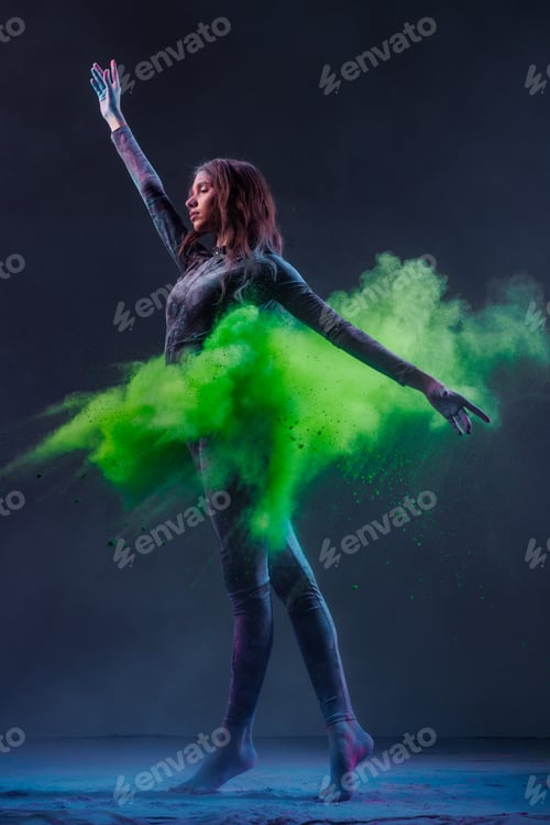 Preview: Graceful female dancer in motion with vibrant green powder explosion, creating a dynamic