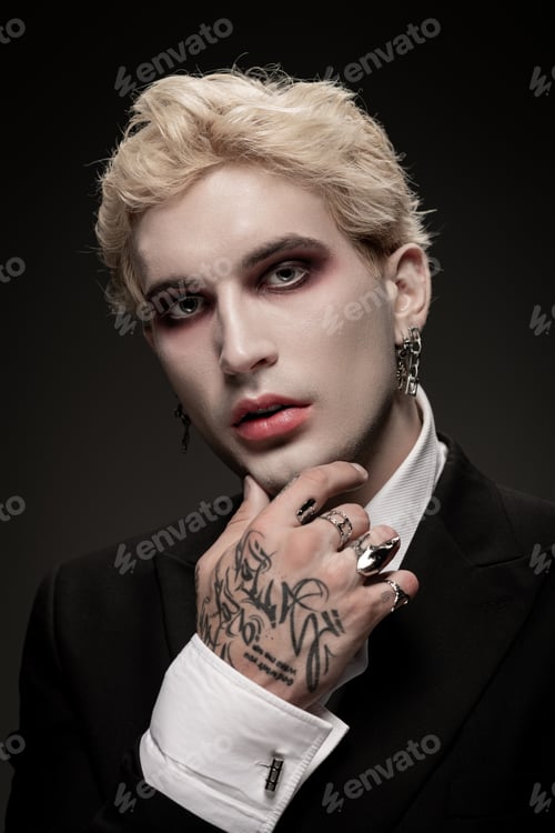 Preview: Young man showcases stunning Halloween costume with captivating style and artistic flair