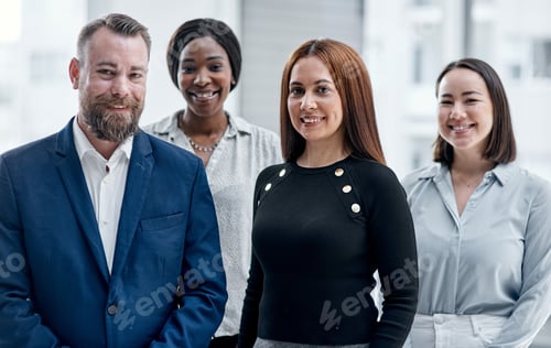 Preview: Portrait of a group of businesspeople standing together in an office