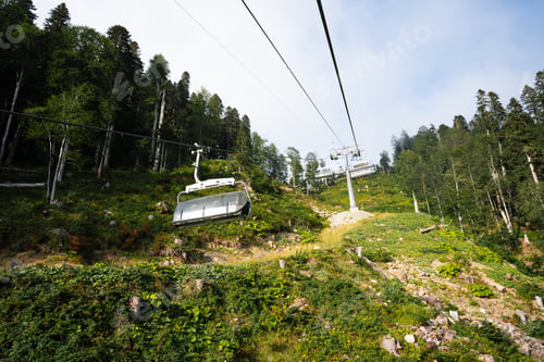 Preview: Chairlift in ski mountain resort at summer time