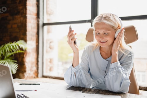 Woman Relaxing Listening Music Indoors