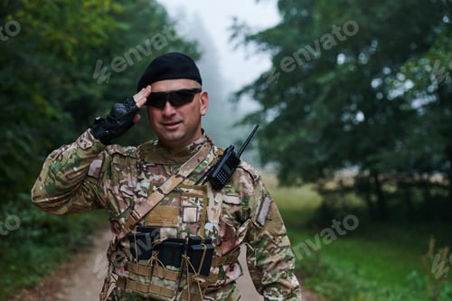Preview: A dedicated soldier salutes his elite unit, showcasing camaraderie and readiness for the most