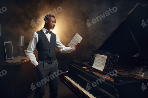 Preview: Ebony pianist with music notebook on the scene