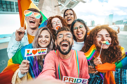 Preview: Diverse group of cheerful young people celebrating gay pride day