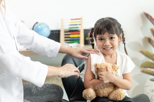 Preview: Young Girl Receives Vaccination from Medical Professional
