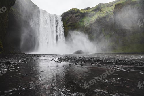 Preview: Skogafoss Iceland famous waterfall. Powerful stream, dramatic view. Iceland golden circle