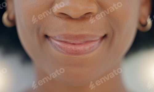 Preview: Closeup of smiling Headshot of a happy woman promoting healthy oral and tooth care routine