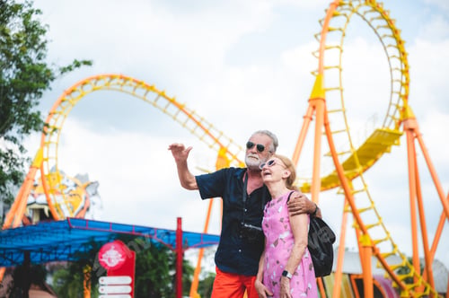 Preview: senior old couple celebration for Valentine's Day at Amusement theme park enjoying