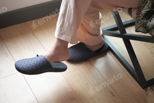Preview: Woman in soft slippers at home