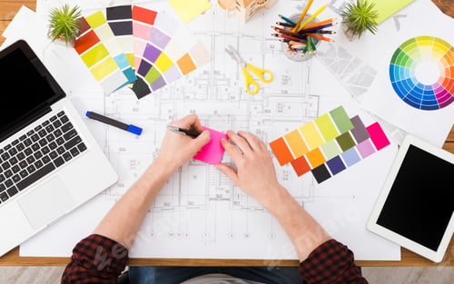 Preview: Interior designer working with palette top view
