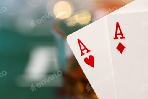 Preview: Playing cards on poker table background close up